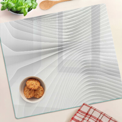 Tabla de cortar de cristal Ondas y líneas en tonos de gris.