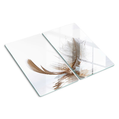 Tabla de cortar de cristal Pluma sobre el fondo del agua
