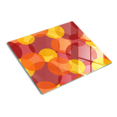 Tabla para cortar Círculos coloridos en tonos cálidos.