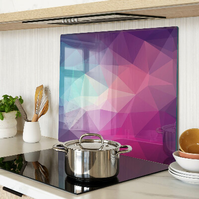 Tabla de cortar de cristal Geometría en tonos rosa y azul.