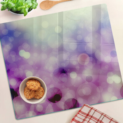 Tabla para cortar Bokeh en tonos morados y rosas