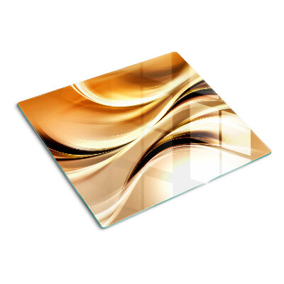 Tabla de cortar de cristal Ondas abstractas en tonos dorados