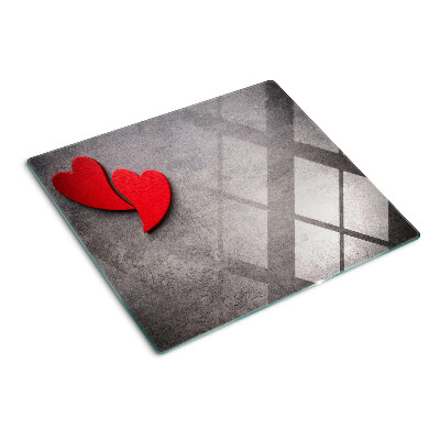 Tabla de cortar de cristal Corazón en el fondo de la ventana.