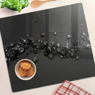 Tabla para cortar Cristales negros en el fondo.