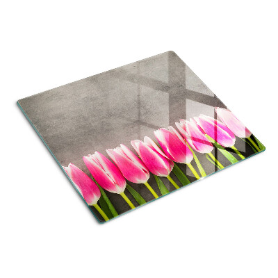 Tabla de cortar de cristal Tulipanes sobre un fondo gris