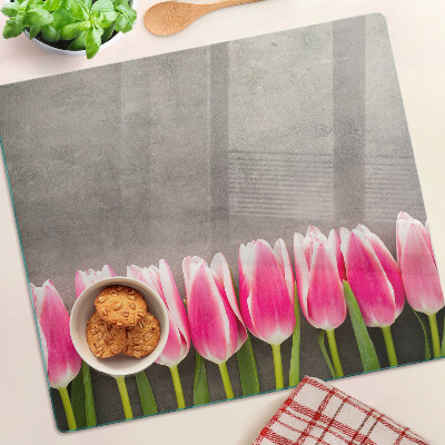 Tabla de cortar de cristal Tulipanes sobre un fondo gris