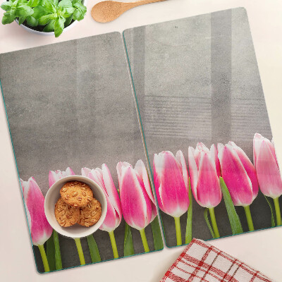 Tabla de cortar de cristal Tulipanes sobre un fondo gris