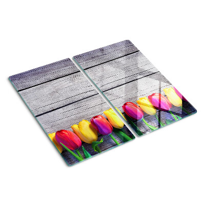 Tabla de cortar de cristal Tulipanes sobre un fondo de madera