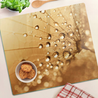 Tabla para cortar Gotas de agua sobre un diente de león