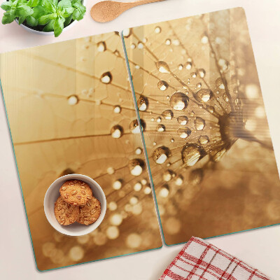 Tabla para cortar Gotas de agua sobre un diente de león