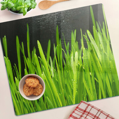 Tabla de cortar de cristal Hierba verde con gotas de agua