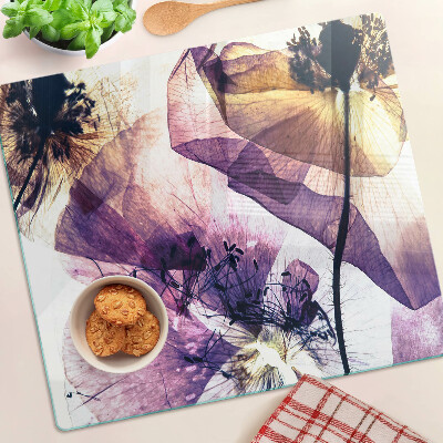Tabla de cortar de cristal Flores en tonos morados y amarillos.