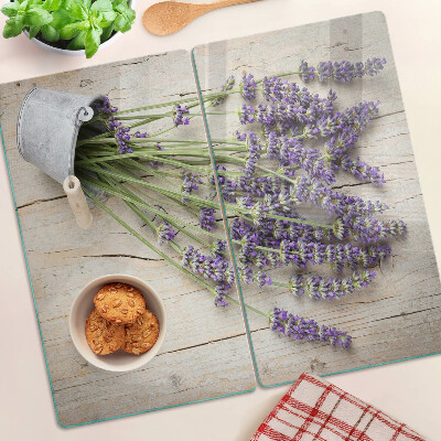 Tabla de cortar de cristal Lavanda en una maceta sobre un fondo de madera