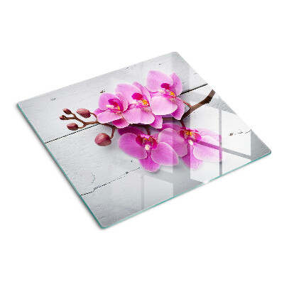 Tabla de cortar de cristal Orquídeas sobre fondo blanco