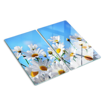 Tabla para cortar Flores de margarita sobre un fondo azul