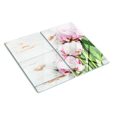 Tabla para cortar Flores de peonía sobre un fondo de madera