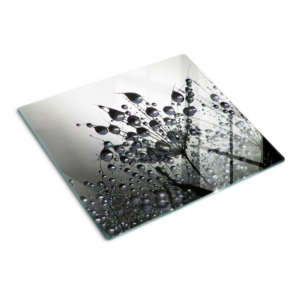 Tabla de cortar de cristal Gotas de agua sobre las plantas