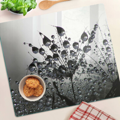 Tabla de cortar de cristal Gotas de agua sobre las plantas