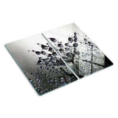 Tabla de cortar de cristal Gotas de agua sobre las plantas