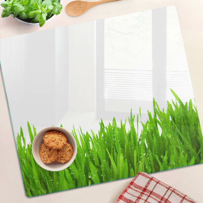 Tabla de cortar de cristal Hierba verde con gotas de agua