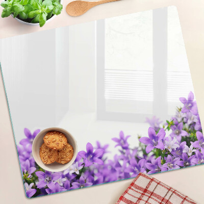 Tabla para cortar Flores moradas al fondo