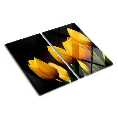 Tabla para cortar Tulipanes amarillos sobre fondo negro