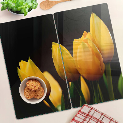 Tabla para cortar Tulipanes amarillos sobre fondo negro