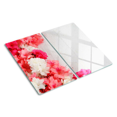 Tabla de cortar de cristal Flores en tonos rosa y blanco.