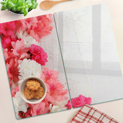 Tabla de cortar de cristal Flores en tonos rosa y blanco.
