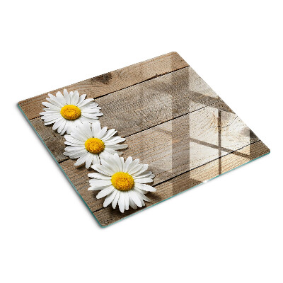 Tabla de cortar de cristal Flores sobre un fondo de madera