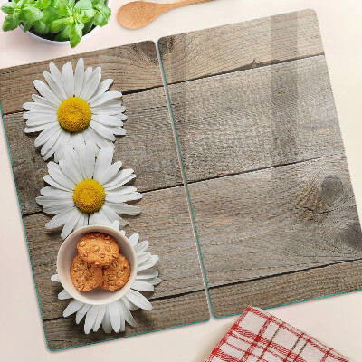 Tabla de cortar de cristal Flores sobre un fondo de madera