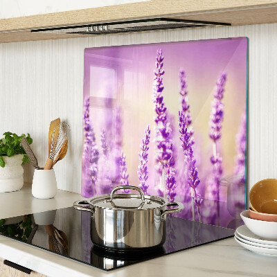 Tabla de cortar de cristal Flores de lavanda sobre un fondo degradado.
