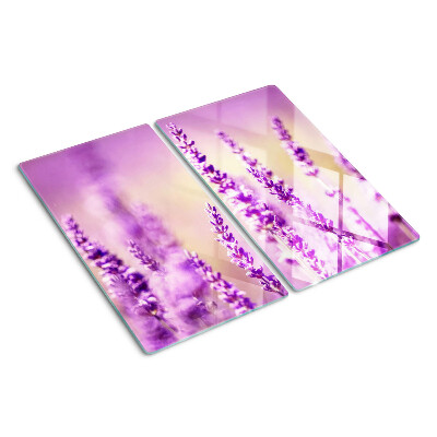 Tabla de cortar de cristal Flores de lavanda sobre un fondo degradado.