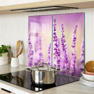 Tabla de cortar de cristal Flores de lavanda sobre un fondo degradado.