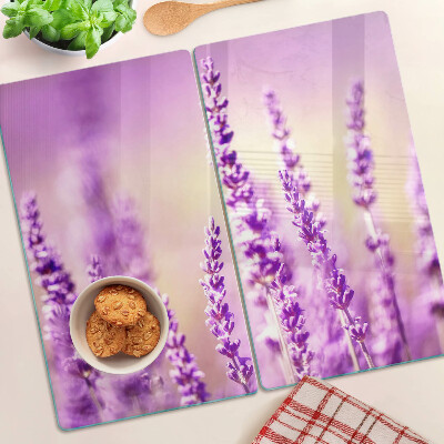 Tabla de cortar de cristal Flores de lavanda sobre un fondo degradado.