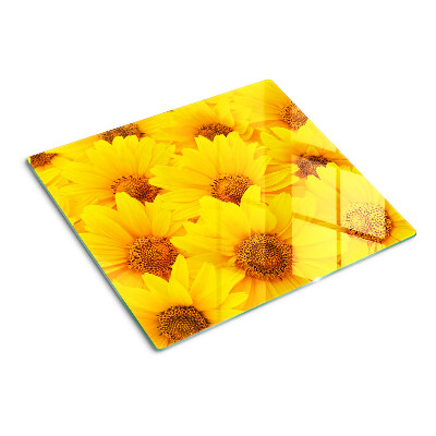 Tabla de cortar de cristal Girasoles sobre un fondo amarillo