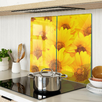 Tabla de cortar de cristal Girasoles sobre un fondo amarillo