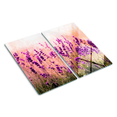 Tabla de cortar de cristal Campo de lavanda bajo los rayos del sol.