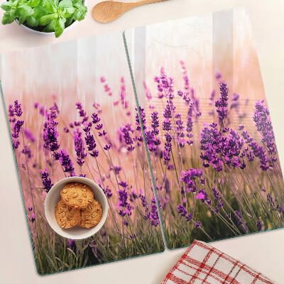 Tabla de cortar de cristal Campo de lavanda bajo los rayos del sol.