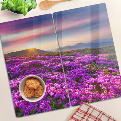 Tabla de cortar de cristal Paisaje de flores al atardecer