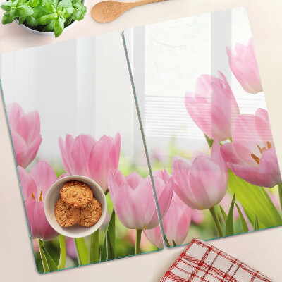 Tabla para cortar Tulipanes rosados en el jardín