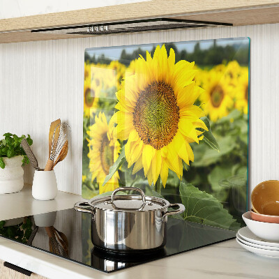 Tabla de cortar de cristal Girasoles sobre un fondo verde