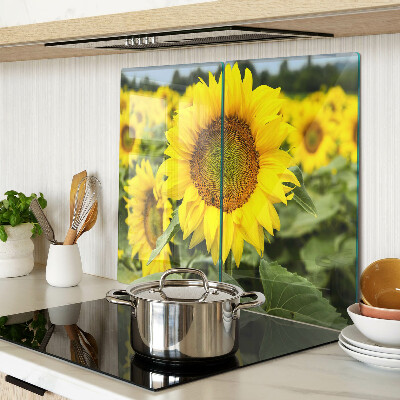 Tabla de cortar de cristal Girasoles sobre un fondo verde
