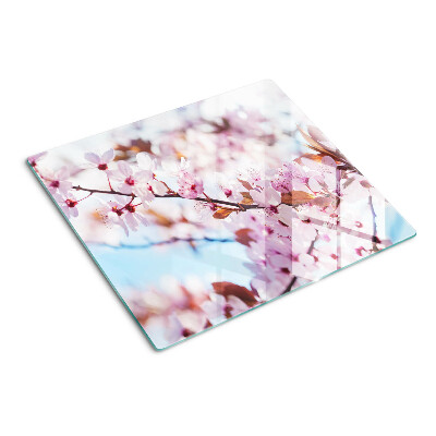 Tabla para cortar Flores de cerezo sobre un fondo azul
