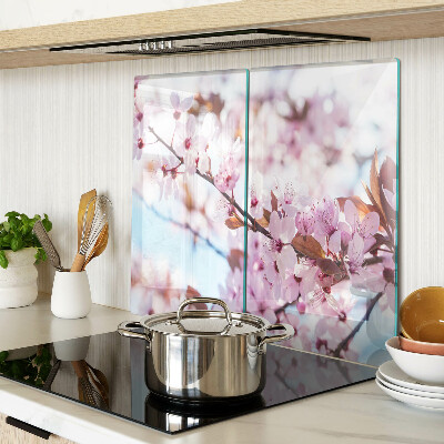 Tabla para cortar Flores de cerezo sobre un fondo azul