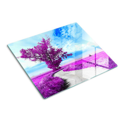 Tabla para cortar Árbol morado contra el cielo