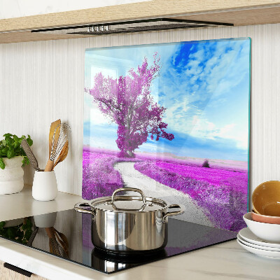 Tabla para cortar Árbol morado contra el cielo