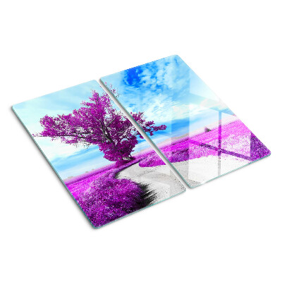 Tabla para cortar Árbol morado contra el cielo