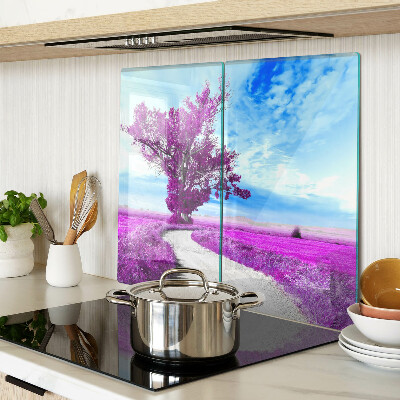 Tabla para cortar Árbol morado contra el cielo