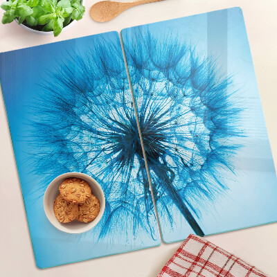 Tabla de cortar de cristal Diente de león sobre fondo azul